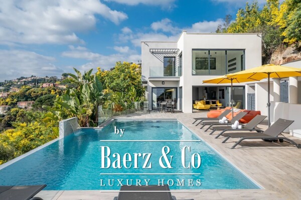 photo 2 Contemporary Elegance at the Gates of Cannes: Sea View & High-End Amenities