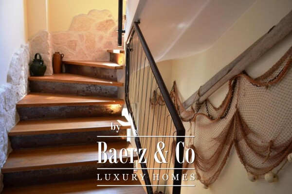 photo 16 Brač, Supetar, a house with a total area of 372 m² located on a plot of 411 m².